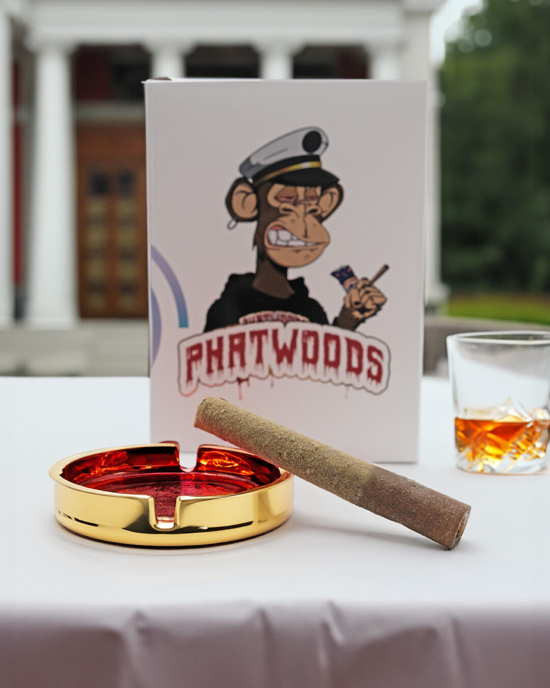 Gold ashtray with Phatwoods blunt